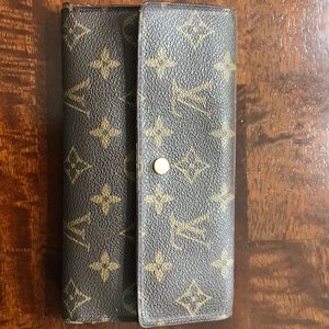 Louis Vuitton trifold wallet.